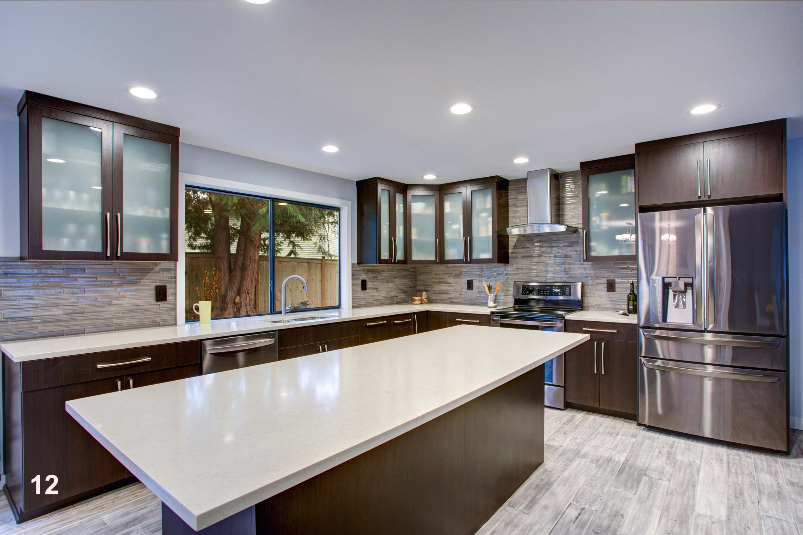 Updated contemporary kitchen room interior in white and dark ton kitchen remodeling in Orange County CA